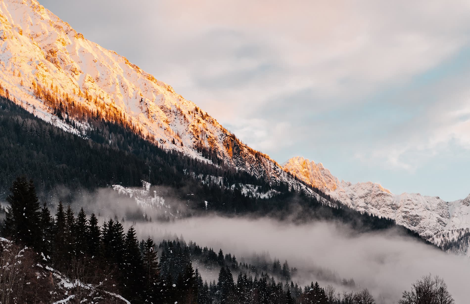 Sonnenaufgang über dem Kleinarltal im Winter